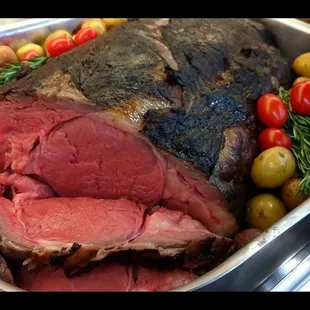 a roast of beef and vegetables