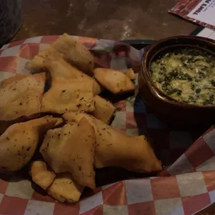 Spinach and artichoke dip with homemade pita chips!
