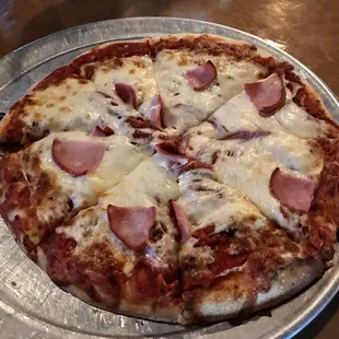 Medium pizza with Beef, Canadian Bacon, and White Onion.  Absolutely delicious!