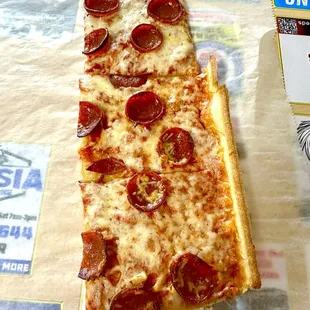 Pepperoni Pizza by the Slice ($8.00 for 3 slices)
