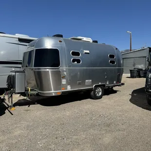 Camper has a lift kit and rugged tires.