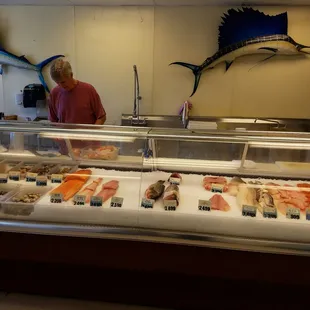 Tom the proud expert fishmonger.