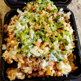 Full size Nachos. $11.99. Ian loves this. Enough portion for 3 meals!