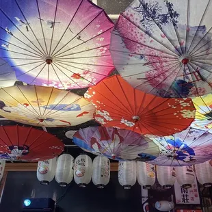 umbrellas hanging from the ceiling