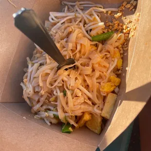 a fork in a box of noodles