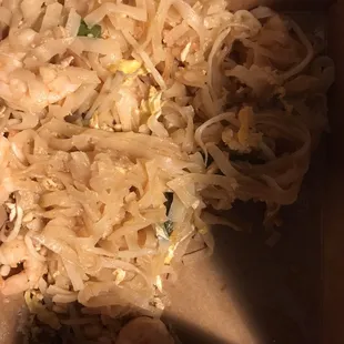 a box of noodles and shrimp