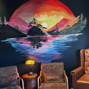 Mural near a lounge type area.