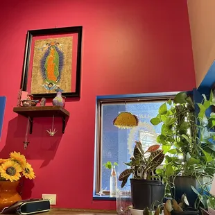 a wooden table with a potted plant on it