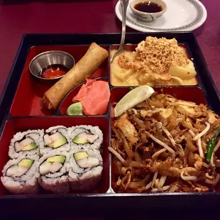 Lunchbox special - spring roll, curry, pad Thai, cali roll.