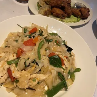 Spicy Chicken Wings & Fried Rice. (Spec go with a Soda.)