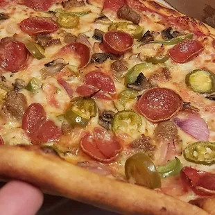 Supreme pie with jalapenos added.