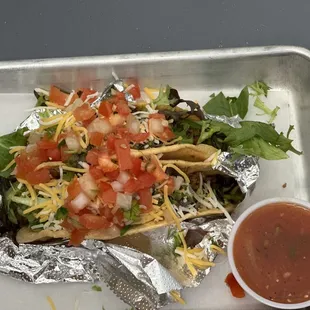 Crispy beef tacos with fresh garden toppings