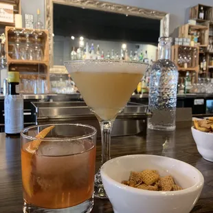 Old Fashioned and Whiskey Sour Proper - and Chex mix. Very simple, pretty bar.