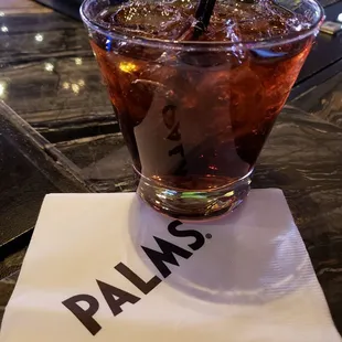 a drink with a straw in a glass