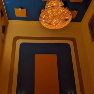 a chandelier hanging from the ceiling