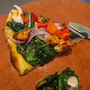 Sweet potato pizza; sweet potatoes, blackened chicken, red onions sage. I added spinach and red peppers, omitted cheese.