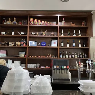 a woman working behind the counter