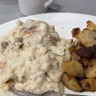Sausage gravy with one biscuit.....Couldn't eat it all!