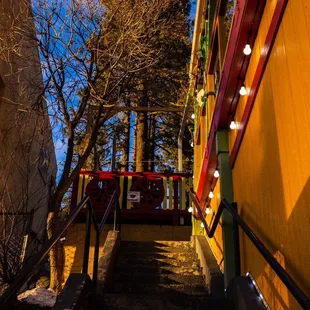 The stairway to heaven - there is a parking lot upstairs that leads directly to the patio !