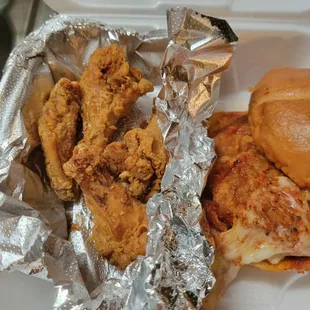 a chicken sandwich and chicken wings