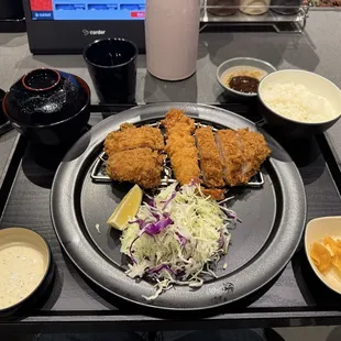 Couple set (one of them), two different types of pork and a large shrimp.