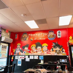 Anime on the wall.