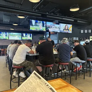 people sitting at the bar