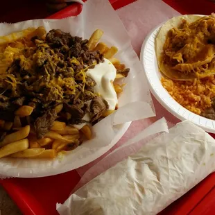 Carne asada fries, kids chicken taco and California Burrito