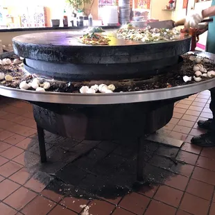 Ton's! All action, all the time. Super great fresh food cooked in your face on a freakin hot slab of metal!