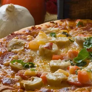 a pizza on a cutting board