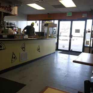 Here's the Pizza Man. Prepares them, cooks them and cuts them.