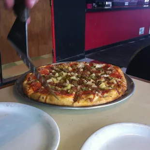 16 inch Pepperoni, Sausage, Jalapeño, &amp; Pineapple pizza.