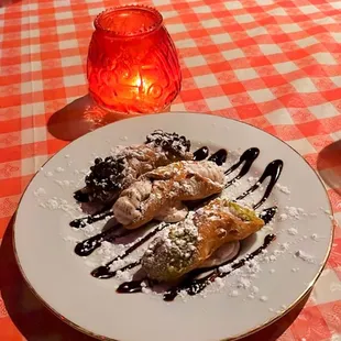 Choc chip, vanilla, and pistachio cannoli. Pistachio was the best flavor. Cherry is also another flavor choice.