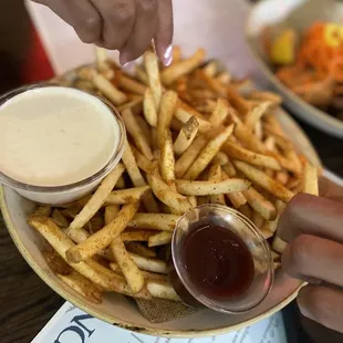 old bay fries with a side house made ranch snd bbq sauce