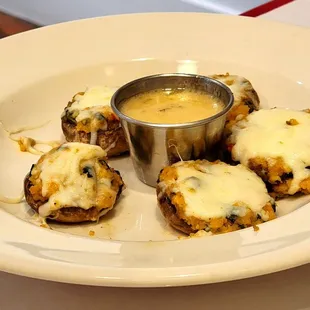 Stuffed mushroom appetizer with dipping sauce