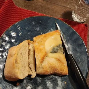 Both sides of the Stromboli were 1/2 bread. First side shocked me enough to take a picture of the second side. Not worth it!