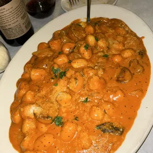 a plate of pasta and shrimp