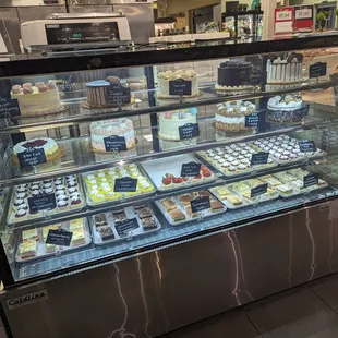 a display of cakes and pastries