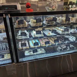 a display case full of desserts