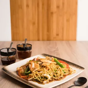 a plate of stir fried noodles