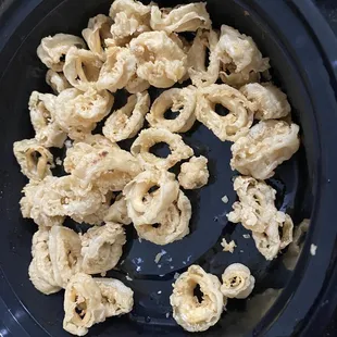 Calamari is small, chewy, overcooked, and full of batter. Not worth $17.