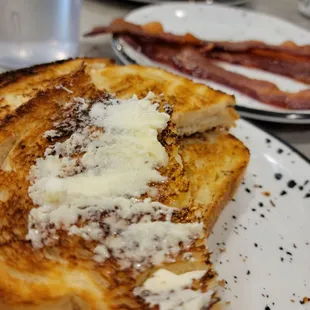 White buttered toast and bacon