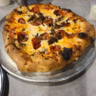 Sausage pepperoni bick oven pizza