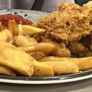 Kids chicken strips and fries.