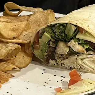 Chicken avocado wrap and chips.