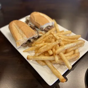Philly cheesesteak sandwich with piping hot fries! It was delicious! $10 with your choice of fries or chips.