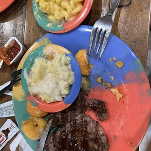 Steak &amp; Shrimp W/mashed potatoes and Mac n Cheese.