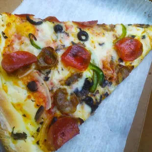 Supreme slice of pizza