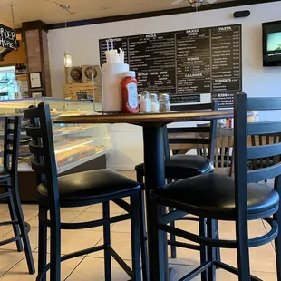 High top table with menu in the background