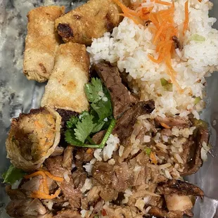 Combination rice plate and extra egg rolls $23